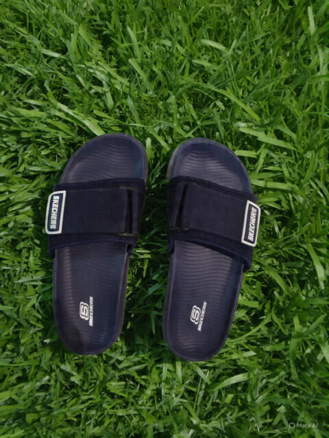 Comfortable Black Slide Sandals on Lush Green Grass